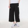 (WMNS) Logo Printing Knitting Casual Pants Black